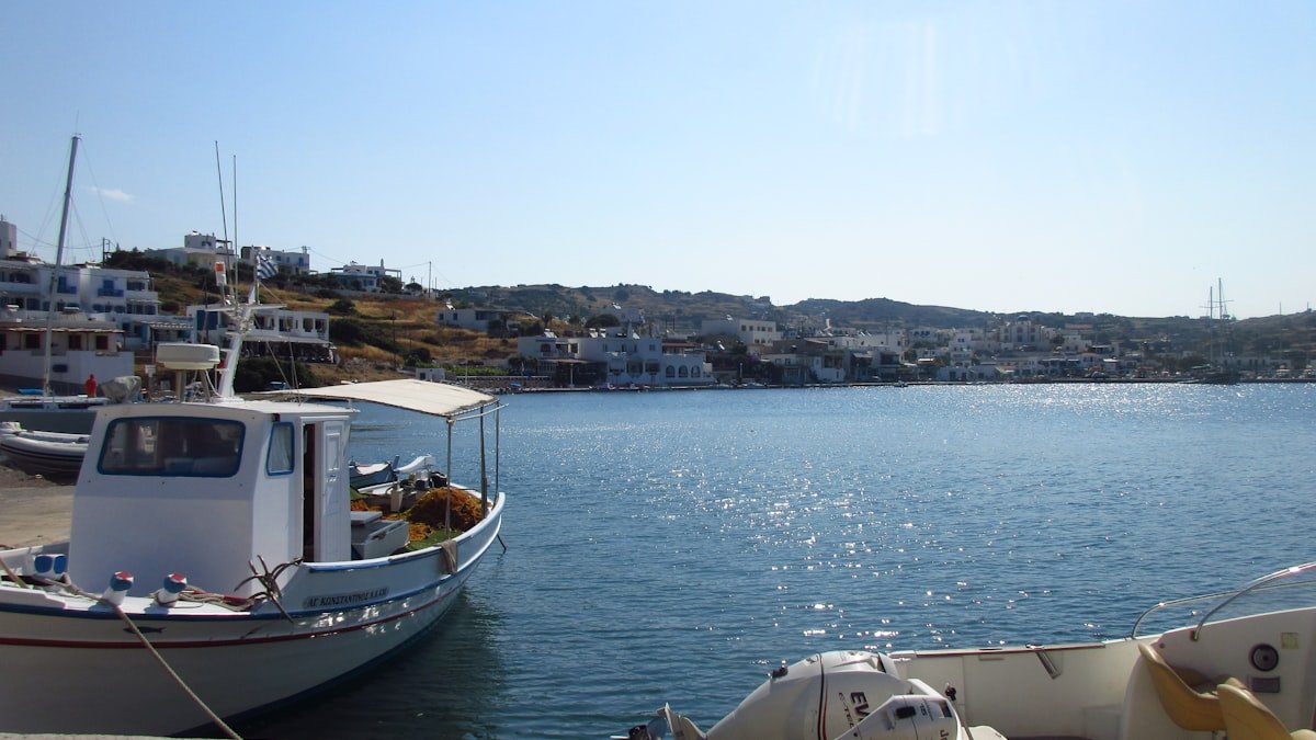 Catamaran at anchor in a Greek island harbour