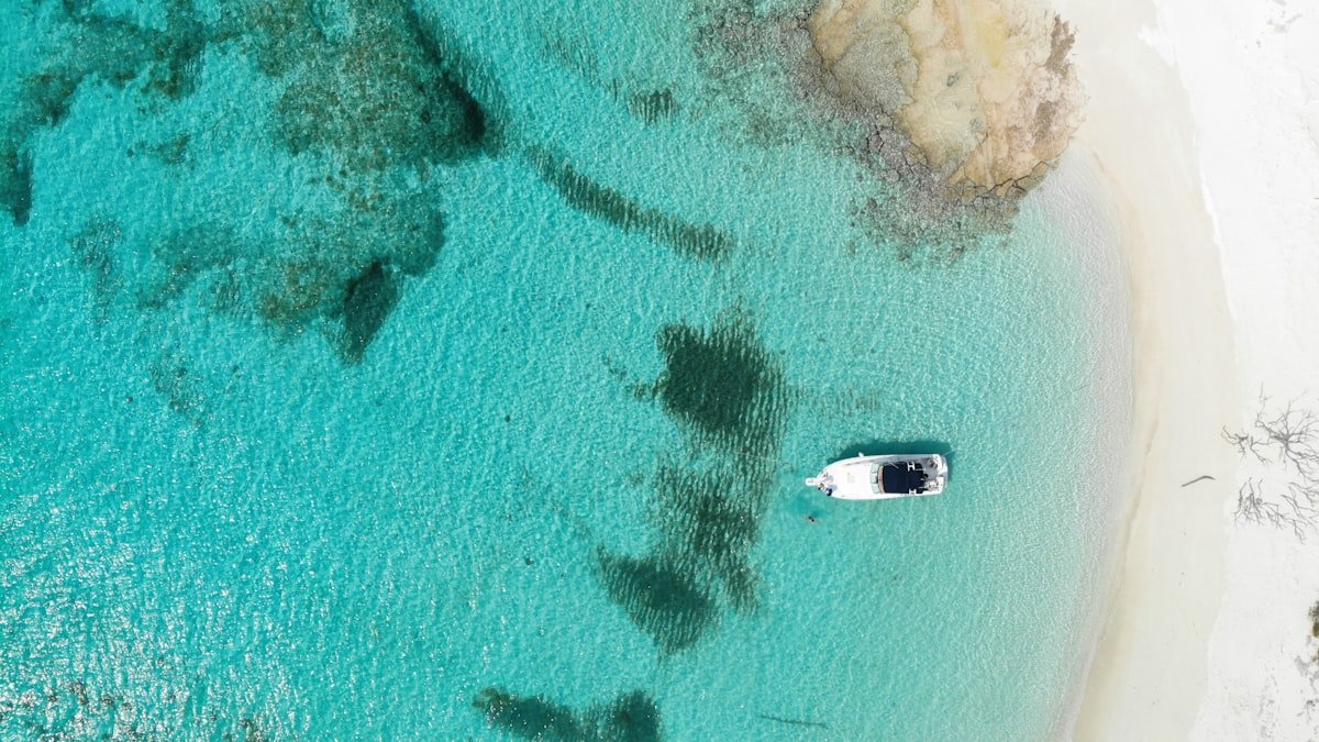 Catamaran at anchor seen from above