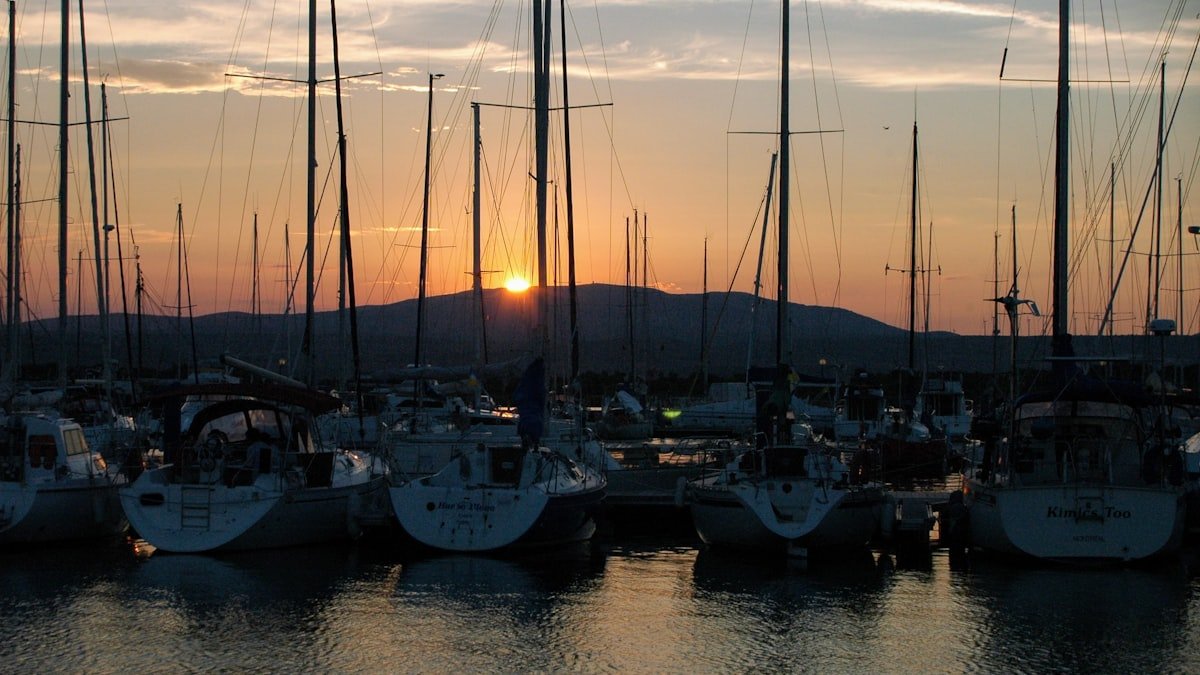 Monohull sailing yacht at a Mediterranean marina pontoon