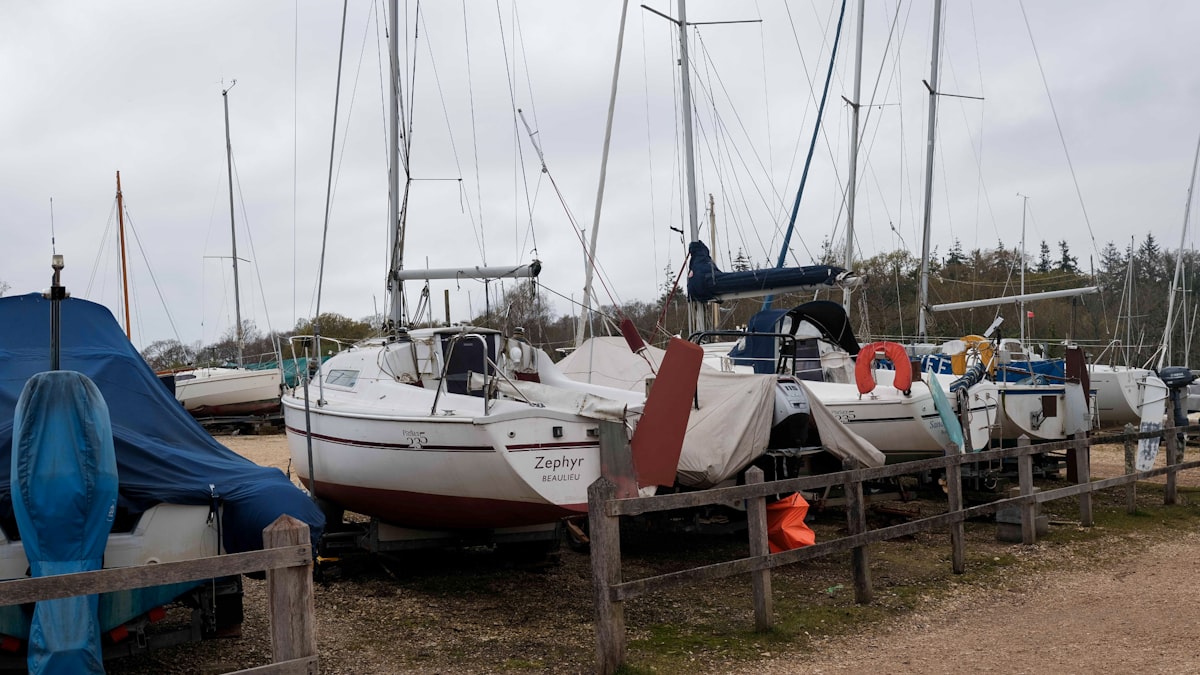 Large catamaran on the hard during haul-out maintenance